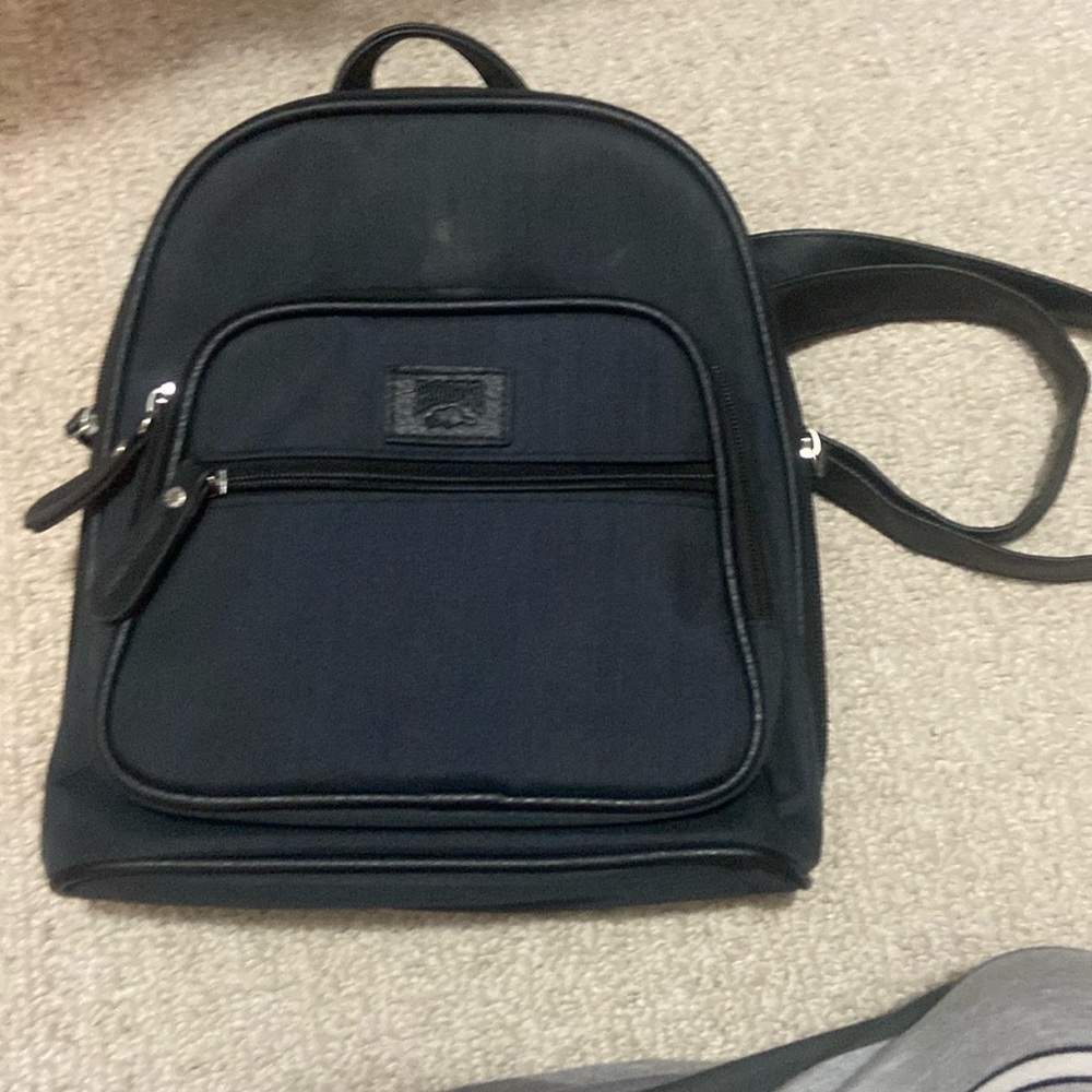 Roots backpack purse